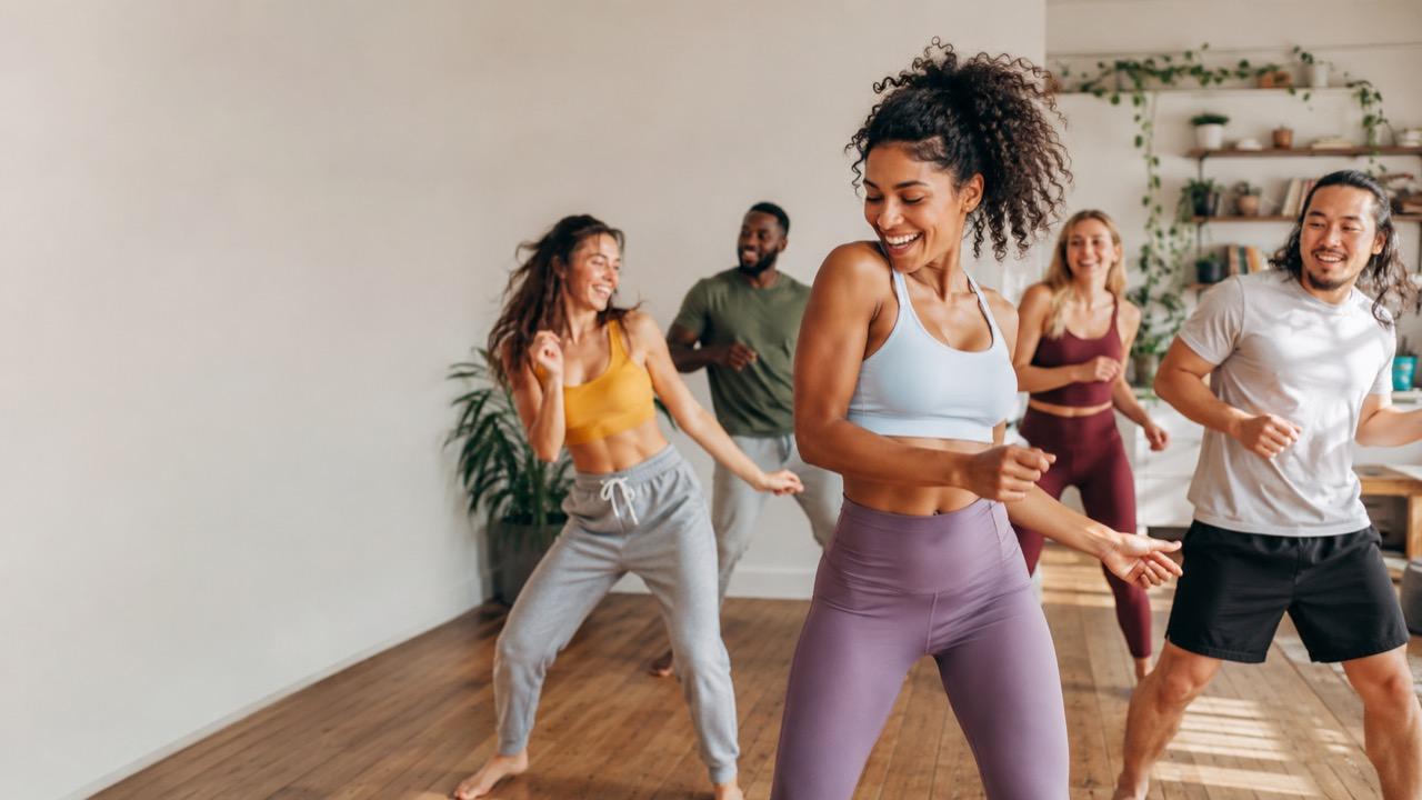 People dancing together in a live Sesh class